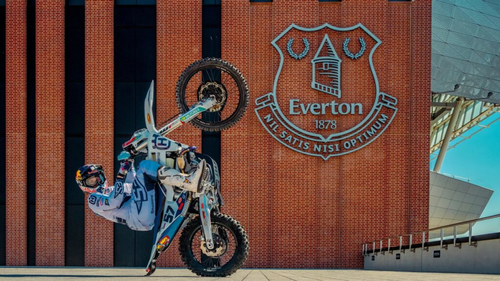 Billy Bolt performing a wheelie outside the new Everton stadium
