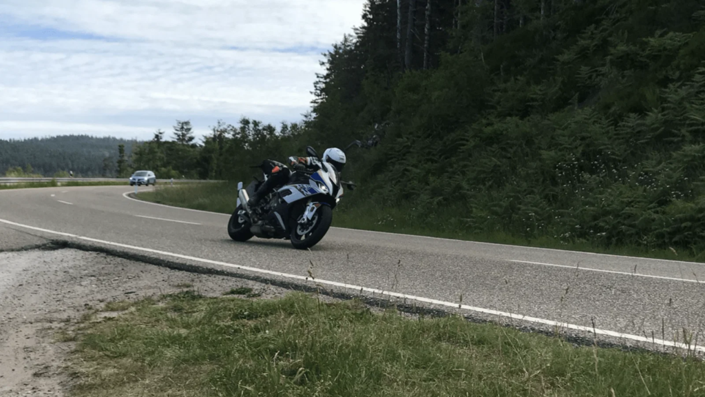 Riding a BMW on a German country road