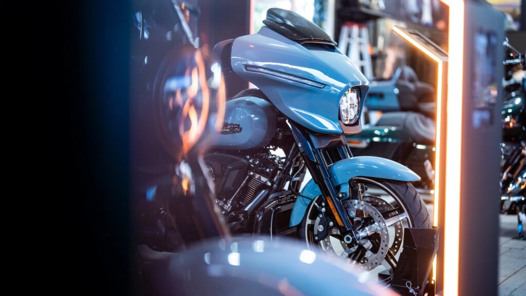 Harley-Davidson motorcycle on stage at an event.