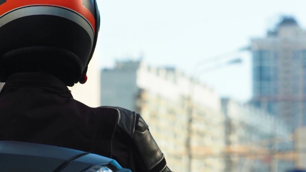 A scooter in a high rise urban environment
